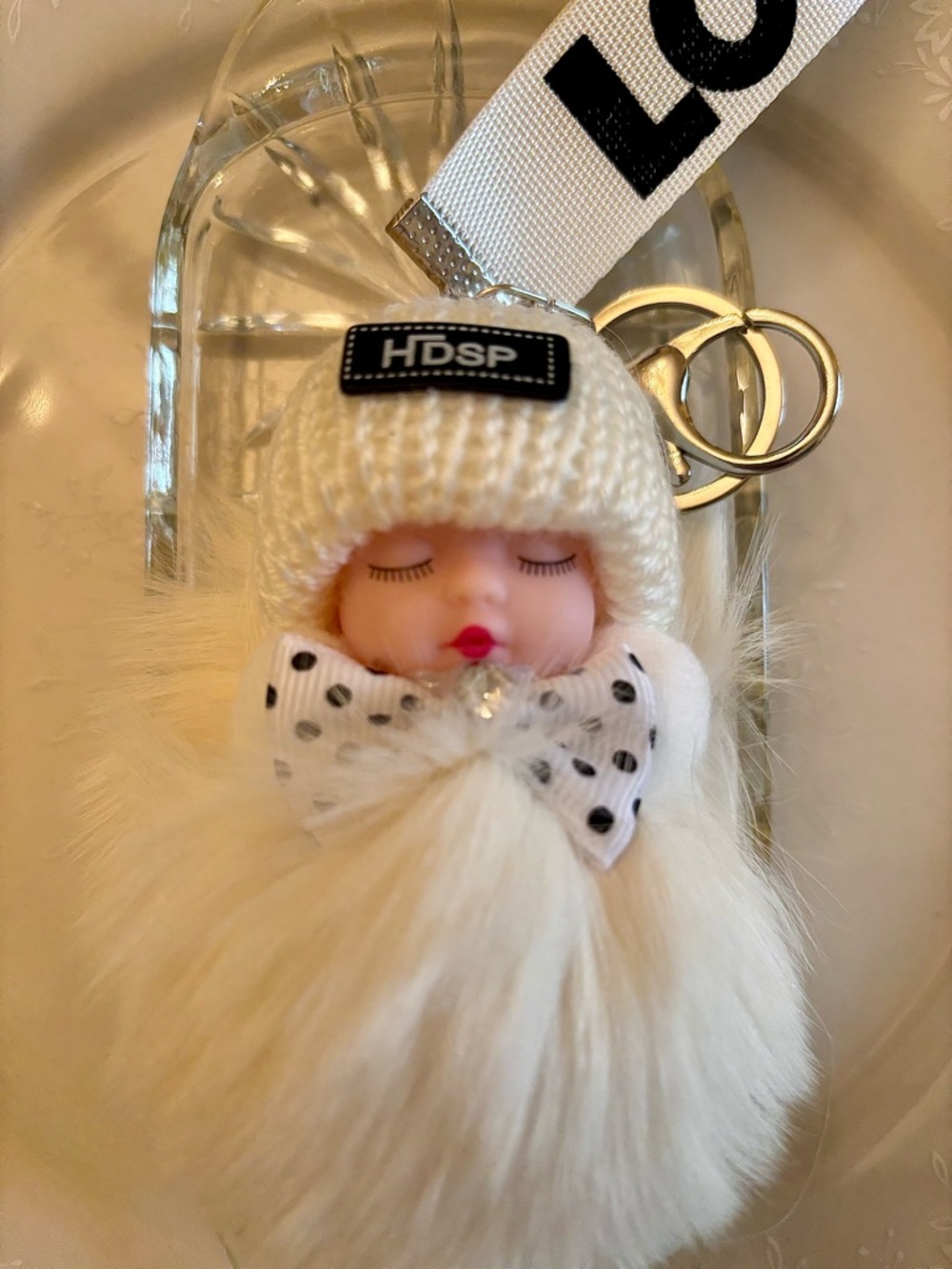 Keychain Sleeping Baby Doll Fluffy White Fur Pom Pom And A Hat That Says Love